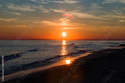 sunset on the beach © Jeniia