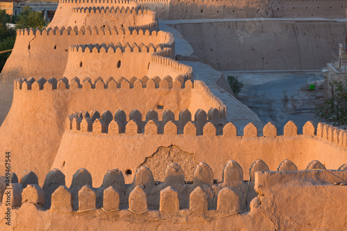 City walls of the ancient city of Khiva at the sunset , Uzbekistan photo