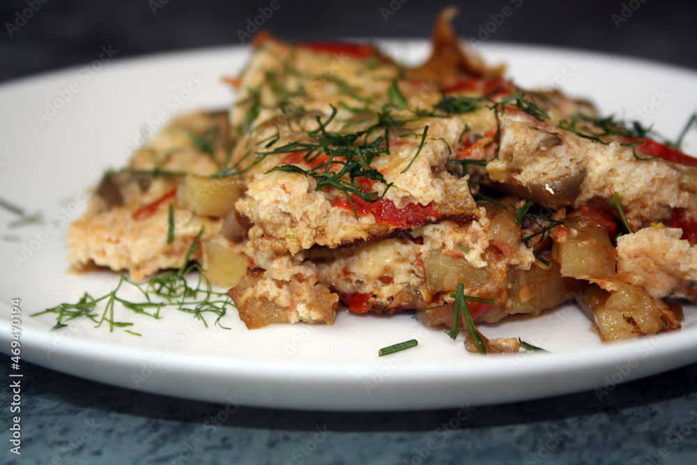 Frittata made from potatoes, peppers, tomatoes and eggplants. A hearty breakfast. Frittata made from potatoes, peppers, tomatoes and eggplants. A hearty breakfast.