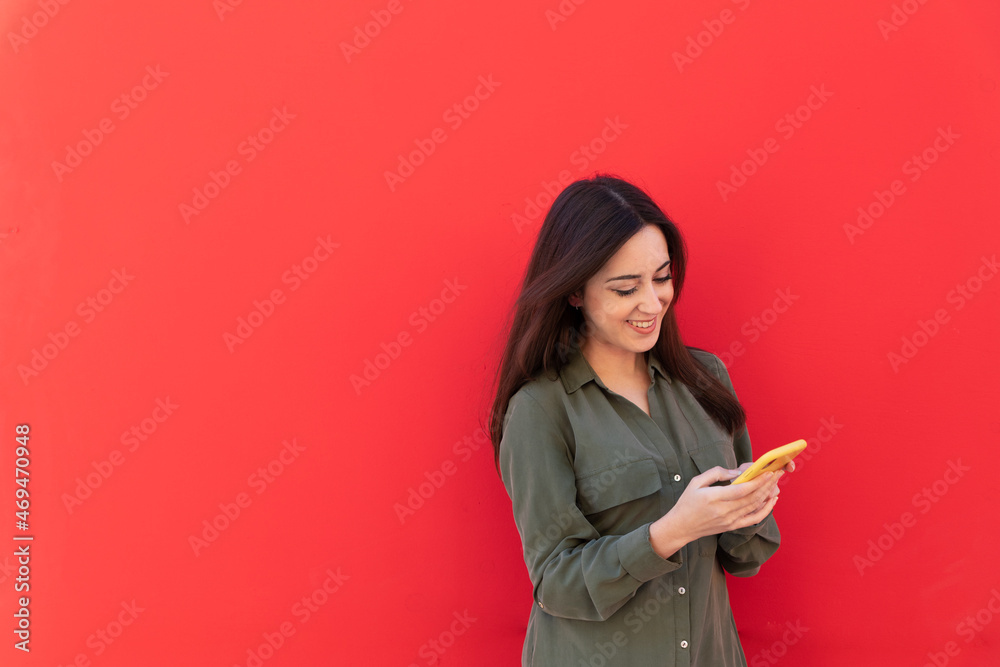 Young Brunette elegant woman wearing a casual green shirt Young Brunette elegant woman wearing a casual green shirt