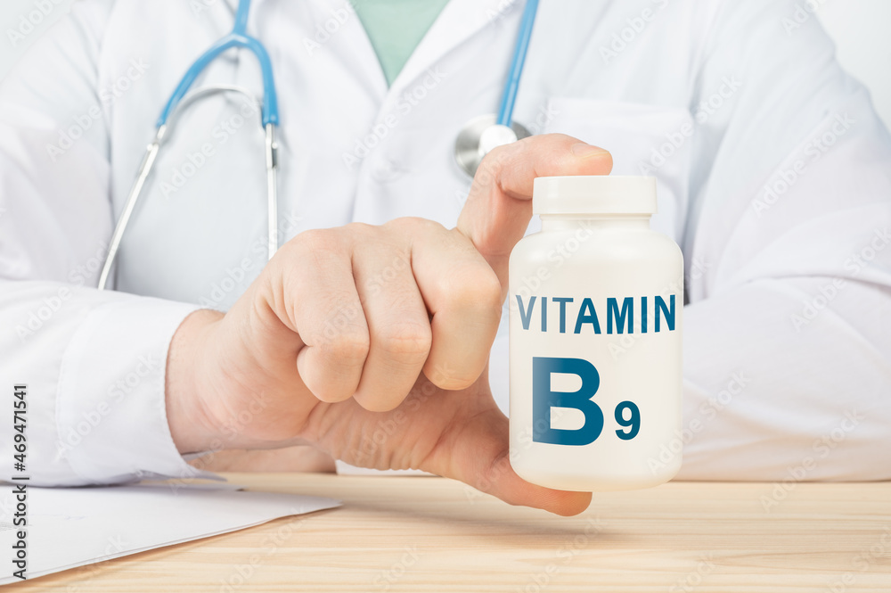 Essential vitamin B9 and minerals for humans. doctor taking