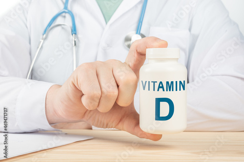 Essential vitamin D and minerals for humans. doctor recommends taking vitamin D. doctor talks about Benefits of vitamin D. D Vitamin - Health Concept