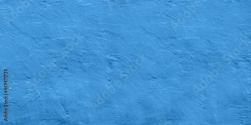 The texture of the plastered wall is blue for the design.