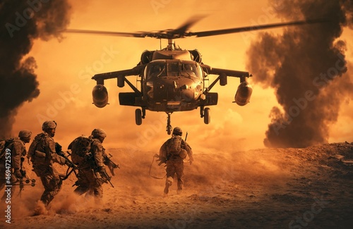 Military soldiers are running to the helicopter in battlefied photo