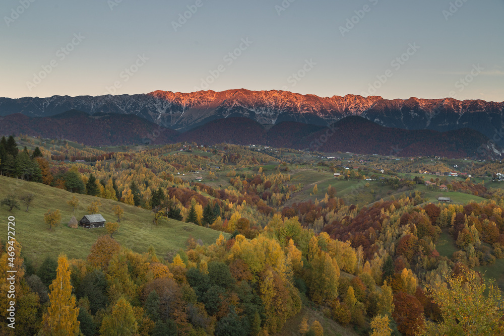 Mountain rural landscape with autumn colors In Brasov county, Romania