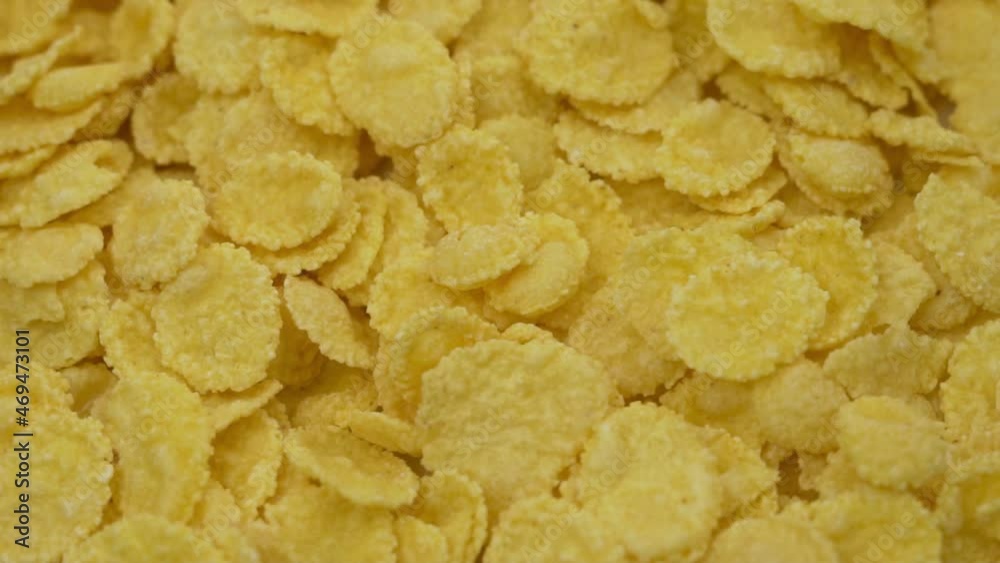 Cornflakes, Close-up. Cornflakes, Rotate. Ready Healthy Cornflakes Breakfast, Isolated. Cornflakes background. Healthy Vegan Food. Cornflakes, Close-up. Cornflakes, Rotate. Ready Healthy Cornflakes Breakfast, Isolated. Cornflakes background. Healthy Vegan Food.