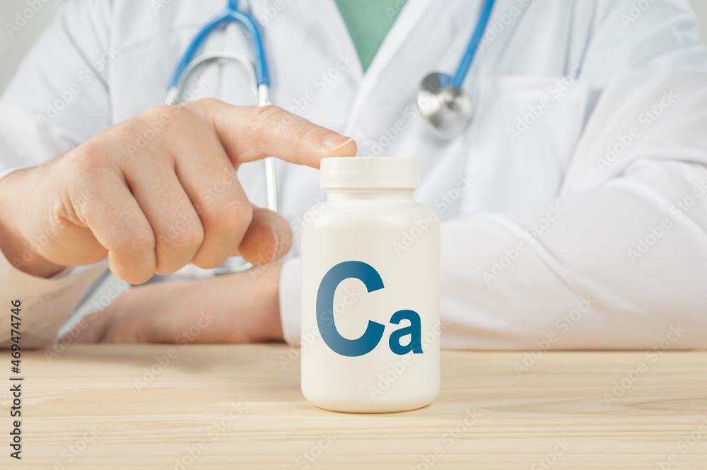 Essential supplement calcium Ca for bone humans. doctor recommends taking calcium. doctor talks about Benefits of calcium. Calcium - Bone Health Concept Essential supplement calcium Ca for bone humans. doctor recommends taking calcium. doctor talks about Benefits of calcium. Calcium - Bone Health Concept