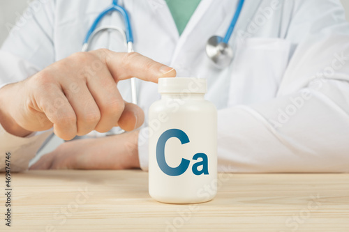 Essential supplement calcium Ca for bone humans. doctor recommends taking calcium. doctor talks about Benefits of calcium. Calcium - Bone Health Concept