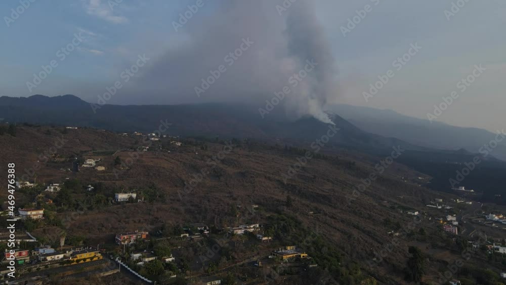 Dense column of smoke rising from Cumbre Vieja volcano, La Palma island. Aerial ascendent Dense column of smoke rising from Cumbre Vieja volcano, La Palma island. Aerial ascendent