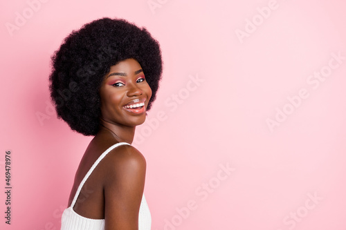 Photo of tender charming lady beaming white smile empty space wear cropped top isolated pink color background