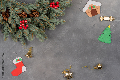 Christmas wreath with golden color candies and baubles useful as Christmas background.