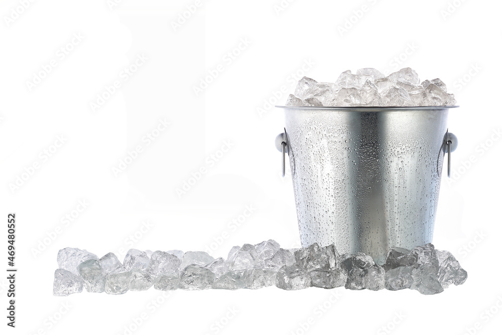 Full metal bucket with ice cubes and pieces of crushed ice isolated on  white background. Stock Photo