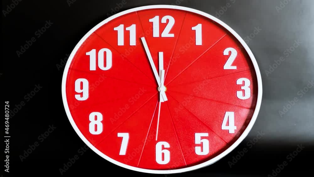 Christmas time concept A large red clock displays a text area background. Waiting to celebrate. Time lapse. Christmas time concept A large red clock displays a text area background. Waiting to celebrate. Time lapse.