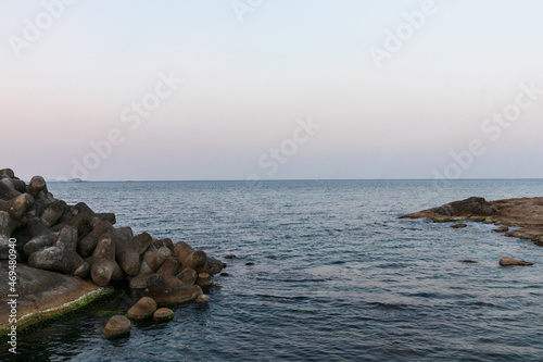 The sunset and the sea view and stones. © eomgraphy