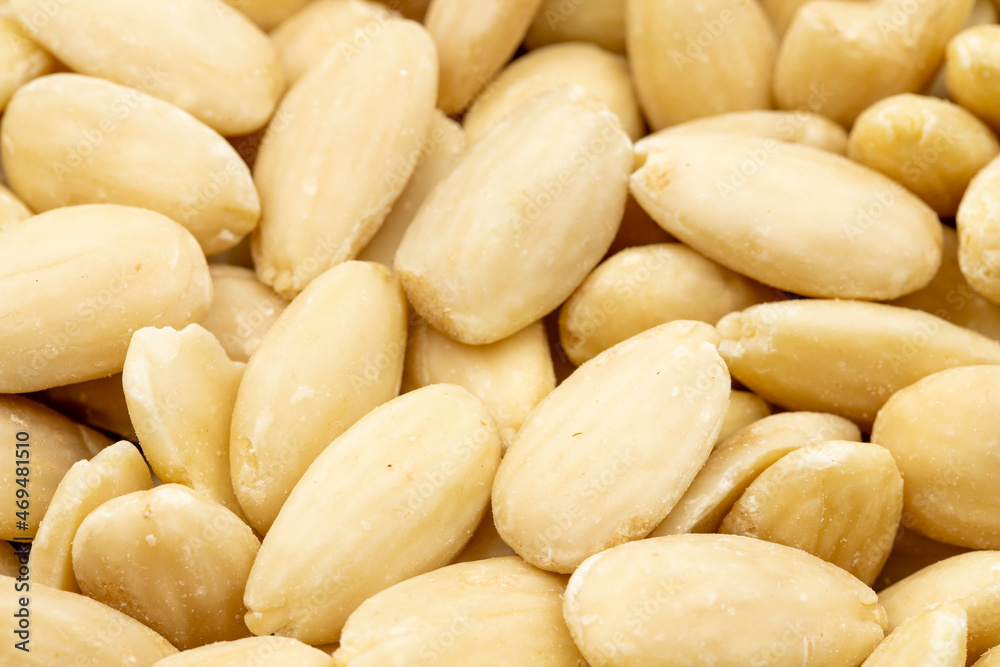 Close-up Peeled almond kernel. food background. Snack Fresh Nuts. Close-up Peeled almond kernel. food background. Snack Fresh Nuts.