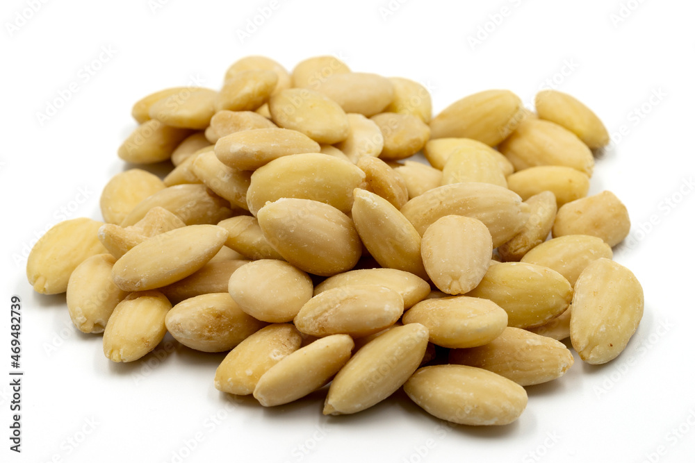 Peeled almond kernel isolated on white background. Snack fresh nuts. close up