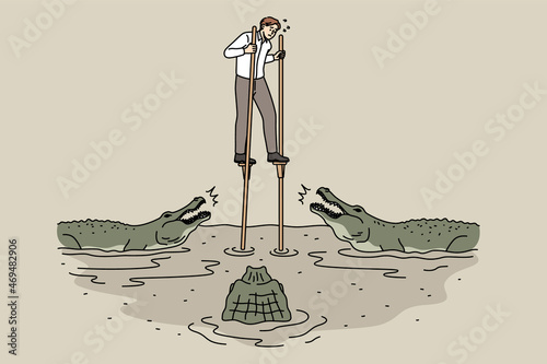 Business danger and challenge concept. Young stressed businessman walking on stilts over river full of crocodiles feeling dangerous vector illustration 