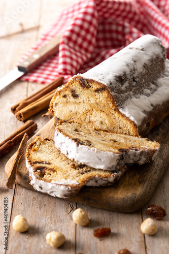 Traditional German Christmas stollen on wooden table	