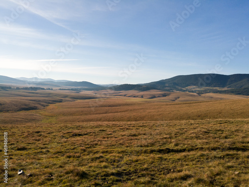 Beautiful hilly landscapes with endless pastures in autumn on the mountain Zlatibor in southern Serbia