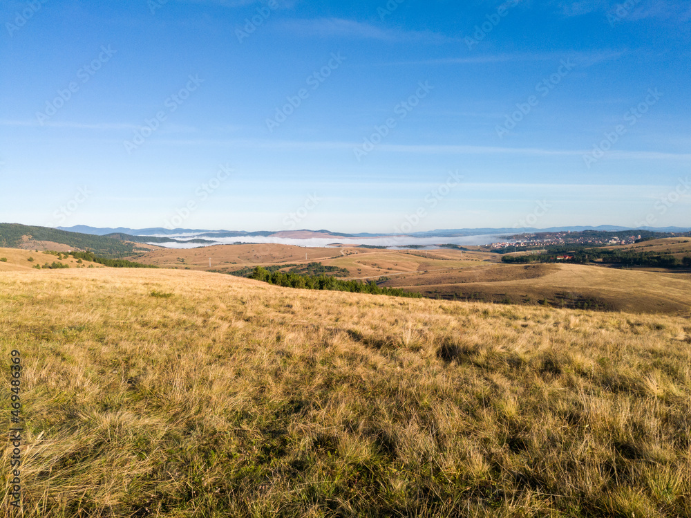 Beautiful hilly landscapes with endless pastures in autumn on the mountain Zlatibor in southern Serbia