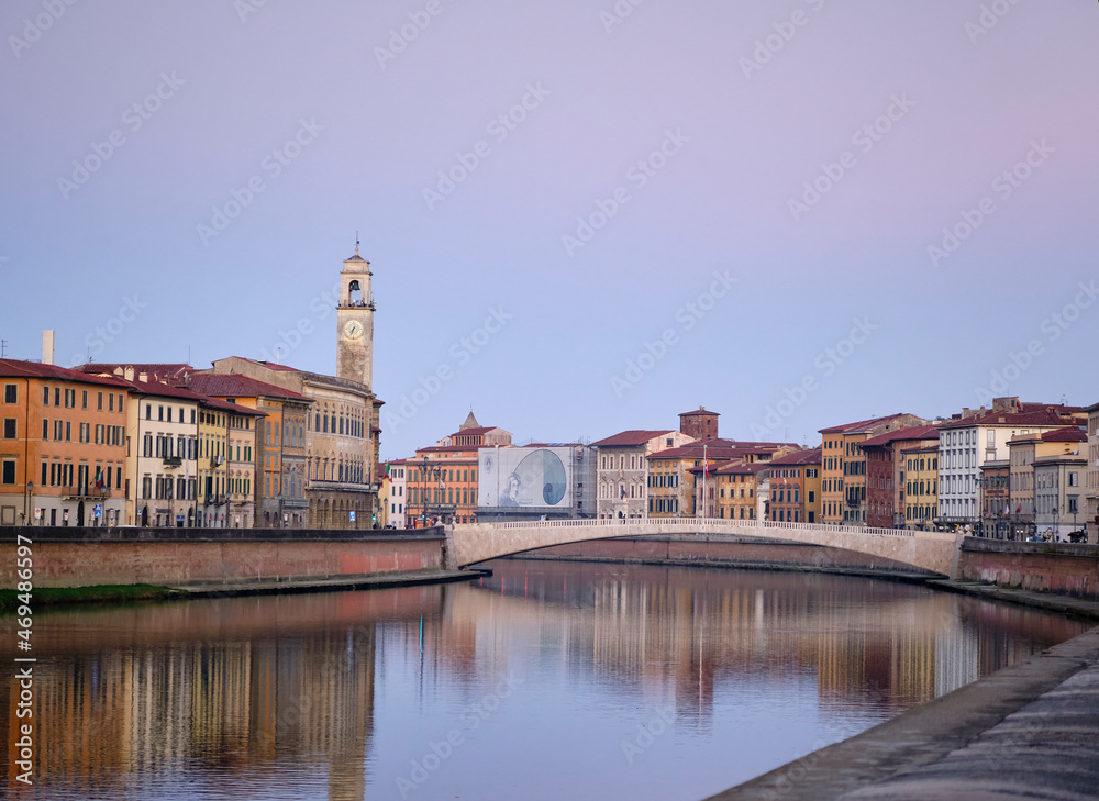 the church of Pisa, tuscany, italy, beside the river and the reflection of the colorful houses the church of Pisa, tuscany, italy, beside the river and the reflection of the colorful houses