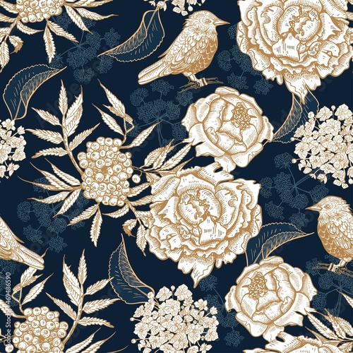 Seamless pattern with flowers and birds. Blue vintage background.