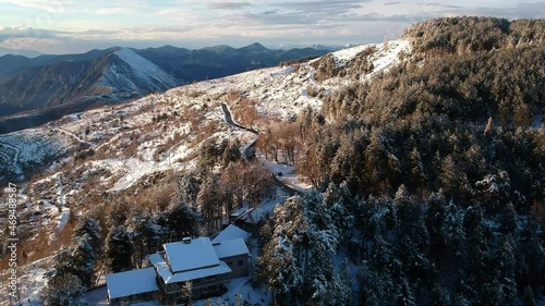 Aerial view of the snowy mountain Taygetus (also known as Taugetus or Taygetos) above Messenia unit in Peloponnese, Greece. Amazing natural scenery of the highest mountain in Peloponnese during winter photo