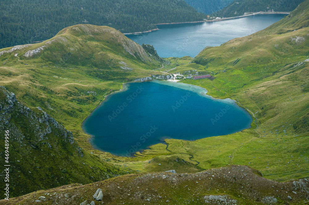 heard-shaped mountain lake Lago di Tom in Val Piora, Ticino