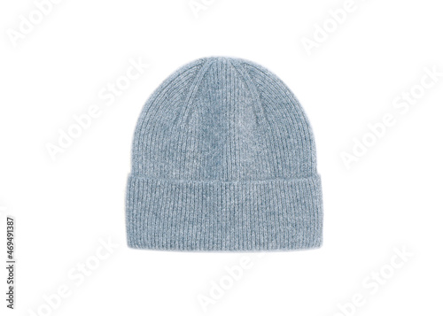 Blue knitted winter hat isolated on white background. Warm Woolen hat. Close shot of cold weather winter handmade knitting clothes.