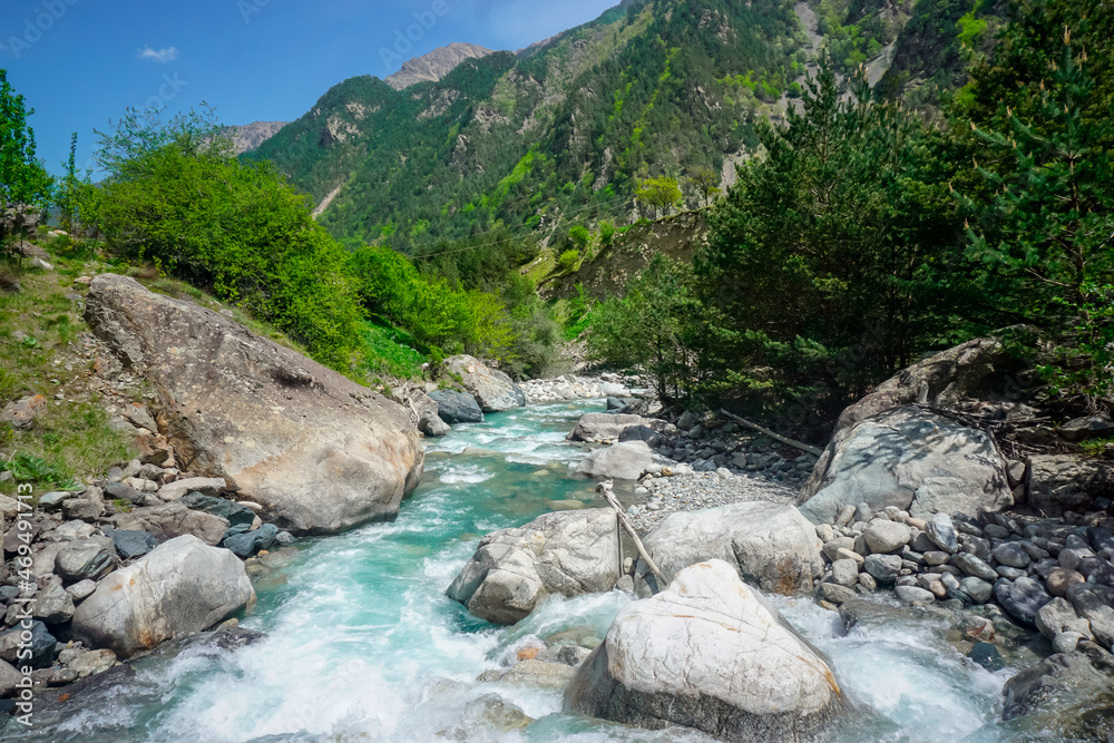 Mountain turquoise river in the village of Buron in North Ossetia Mountain turquoise river in the village of Buron in North Ossetia