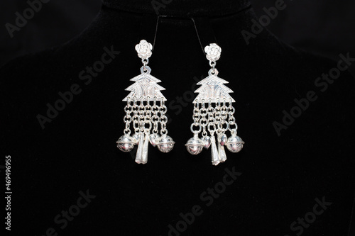 Hill tribe silver earrings on black background