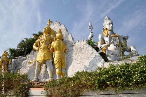 The statue of Shiva with Ravana, and the Shiva's bull-Nandi near the golden chariot Arjuna at Murdeshwar, India