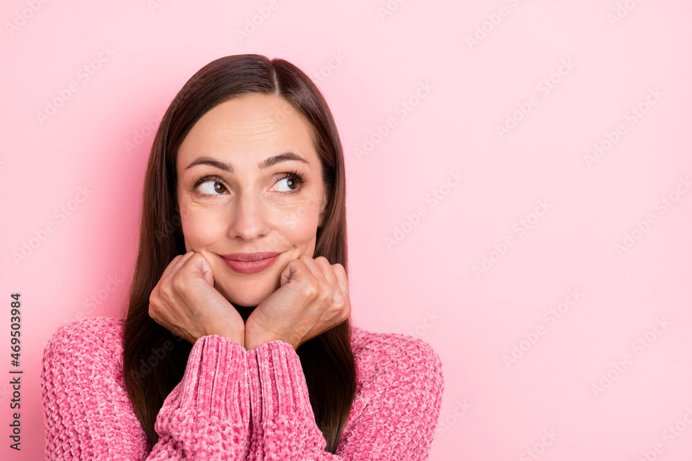 Photo of lovely young lady hands face look promo wear pink sweater isolated on pastel color background Photo of lovely young lady hands face look promo wear pink sweater isolated on pastel color background
