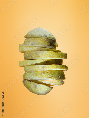Potato slices floating on orange