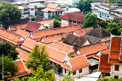 A top view of red tiled roofs in thailand