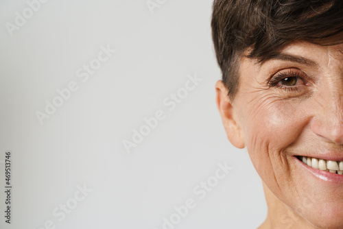Mature european woman smiling and looking at camera