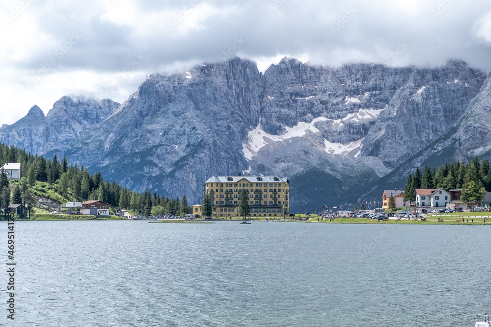 Misurina Lake in calm water. Stunning view on the majestic Dolomites Alp Mountains, Italy, National Park Tre Cime di Lavaredo.