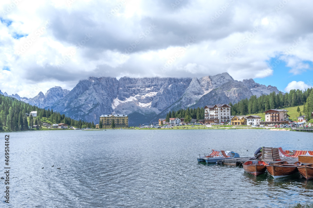 Misurina Lake in calm water. Stunning view on the majestic Dolomites Alp Mountains, Italy, National Park Tre Cime di Lavaredo.