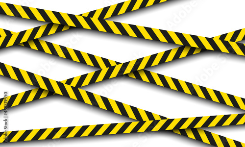 Yellow and black danger cross lines ribbons. photo