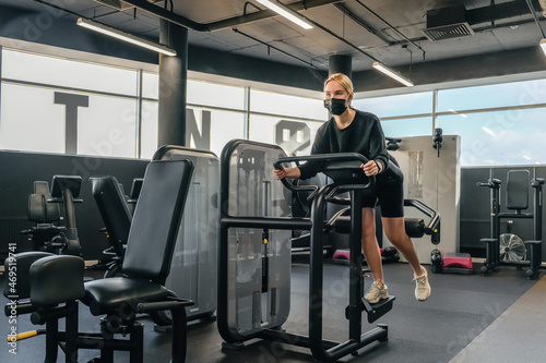 Fitness,sports.fit,Girl in mask fitness gym opening lockdown covid passport,QR cod Wellness, health care,generation z sports recreation concept online fitness apps. workout,training,Fit wellness