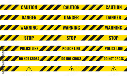 Yellow and black danger ribbons. Police line, crime scene, do not cross, construction site road