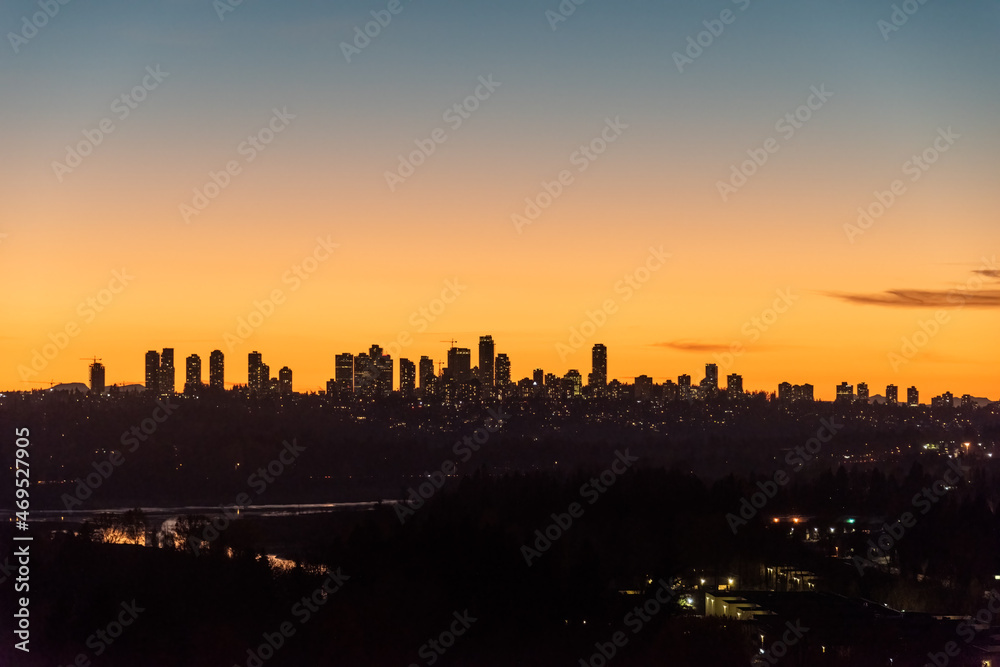 Cityscape on sunset with clear sky background closer to the night