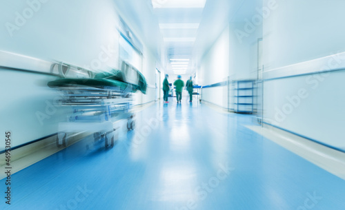 Bild auf Leinwand Doctors or nurses walking in hospital hallway, blurred motion
