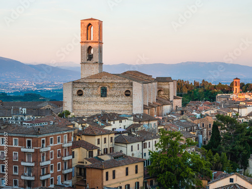 View of St. Domenico's Convent in Perugia from Giardini Carducci at sunset, Perugia, Umbria, Italy photo