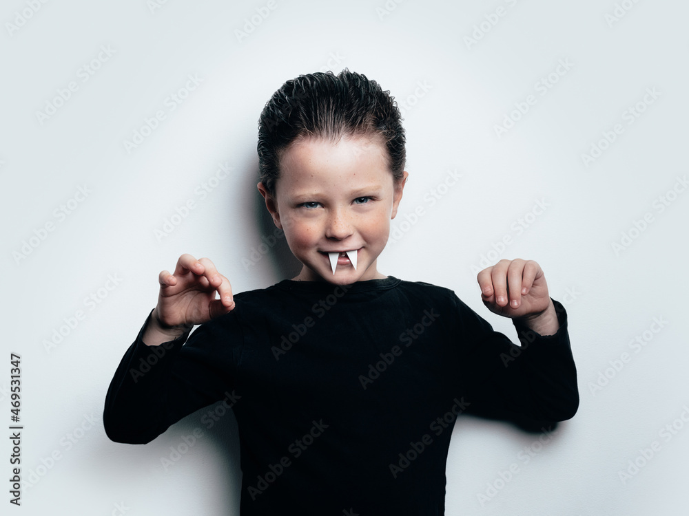 Content boy in vampire outfit Content boy in vampire outfit