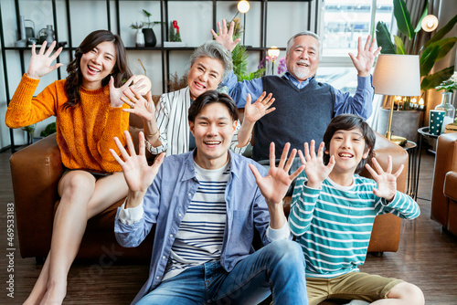 happiness christmas thanksgiving weekend,multi generation asian family visiting grandparent sit relax laugh smile together fun and joyful wonderful moment living room at home,pov asian family together