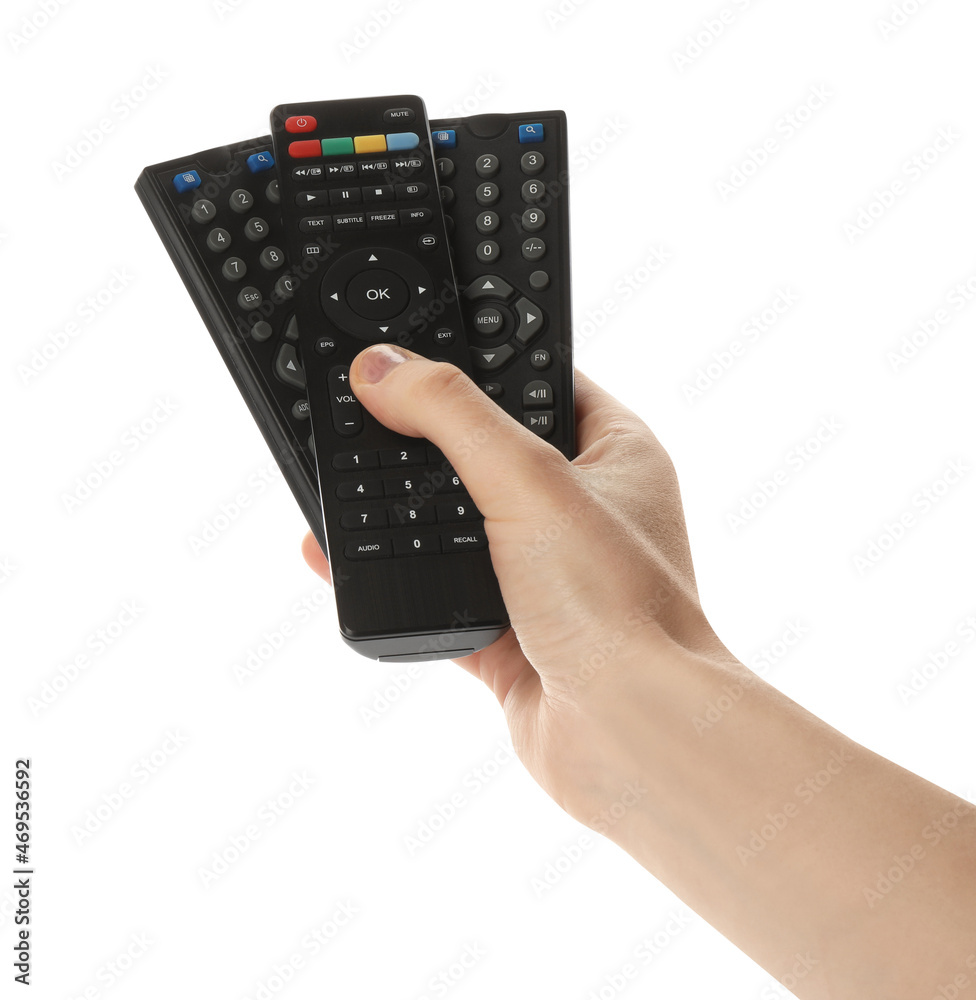 Woman holding remote controls on white background, closeup Woman holding remote controls on white background, closeup