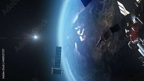 Fototapeta Naklejka Na Ścianę i Meble -  3D Render of astronaut repairing satellite over Earth