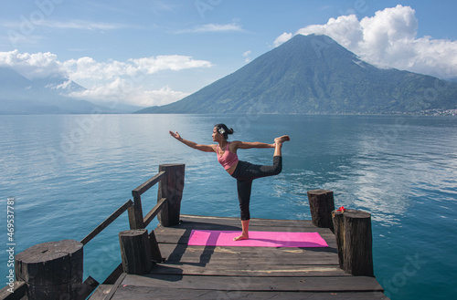 Morning yoga on the dock, San Marcos, Lake Atitlan, Guatemala photo
