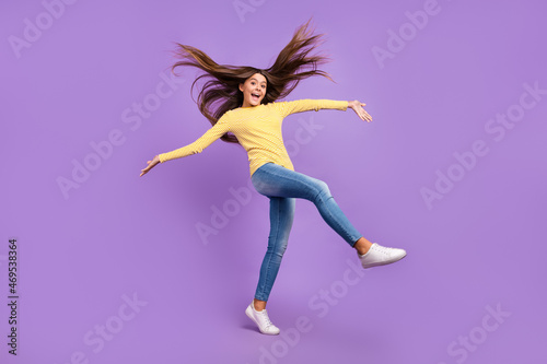 Full body photo of young lovely girl enjoy new hair care lotion isolated over violet color background